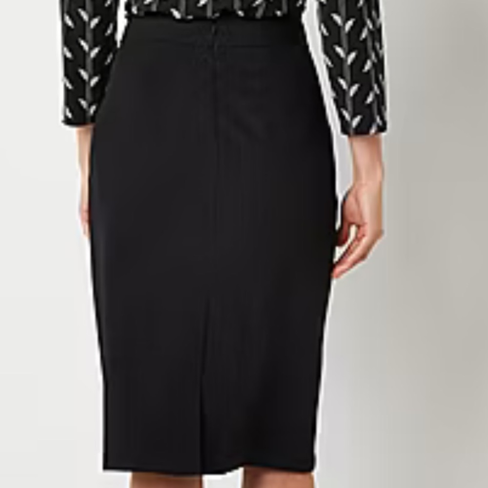 Black Pencil skirt . It’s like brand new maybe wore  twice in my time.